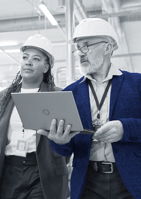two people with hard hats